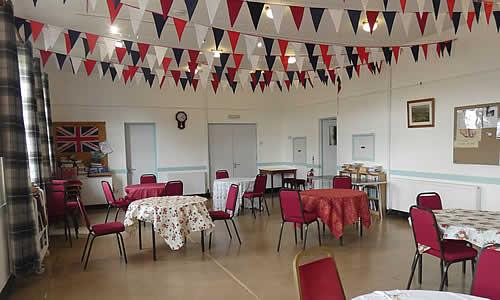 Tables laid for Coffee Morning at the St Keyne Village Hall